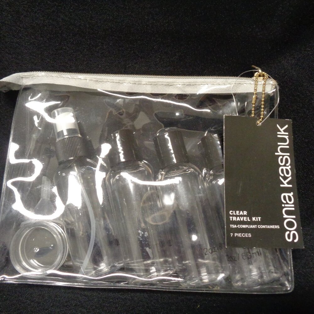 Travel kit:  Clear pouch, 3 bottles( 2 oz) , 1 spray bottle, one jar, one funnel